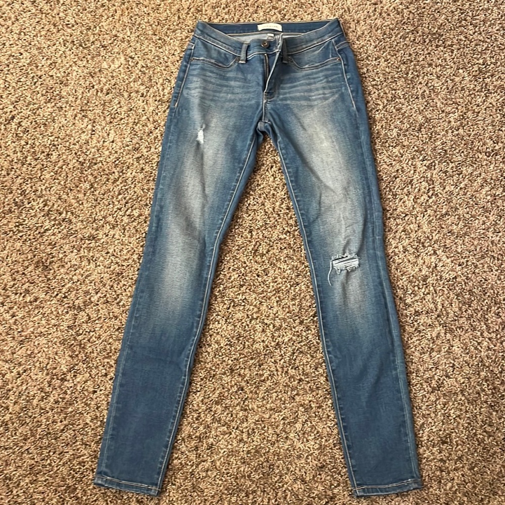 Lightly distressed denim jeans